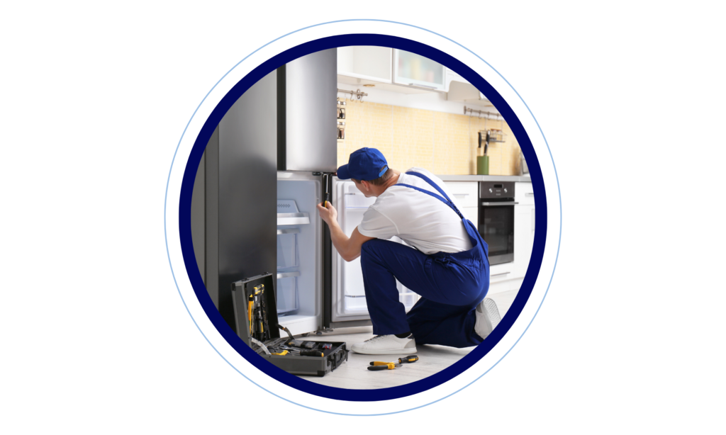 A certified technician fixing a refrigerator